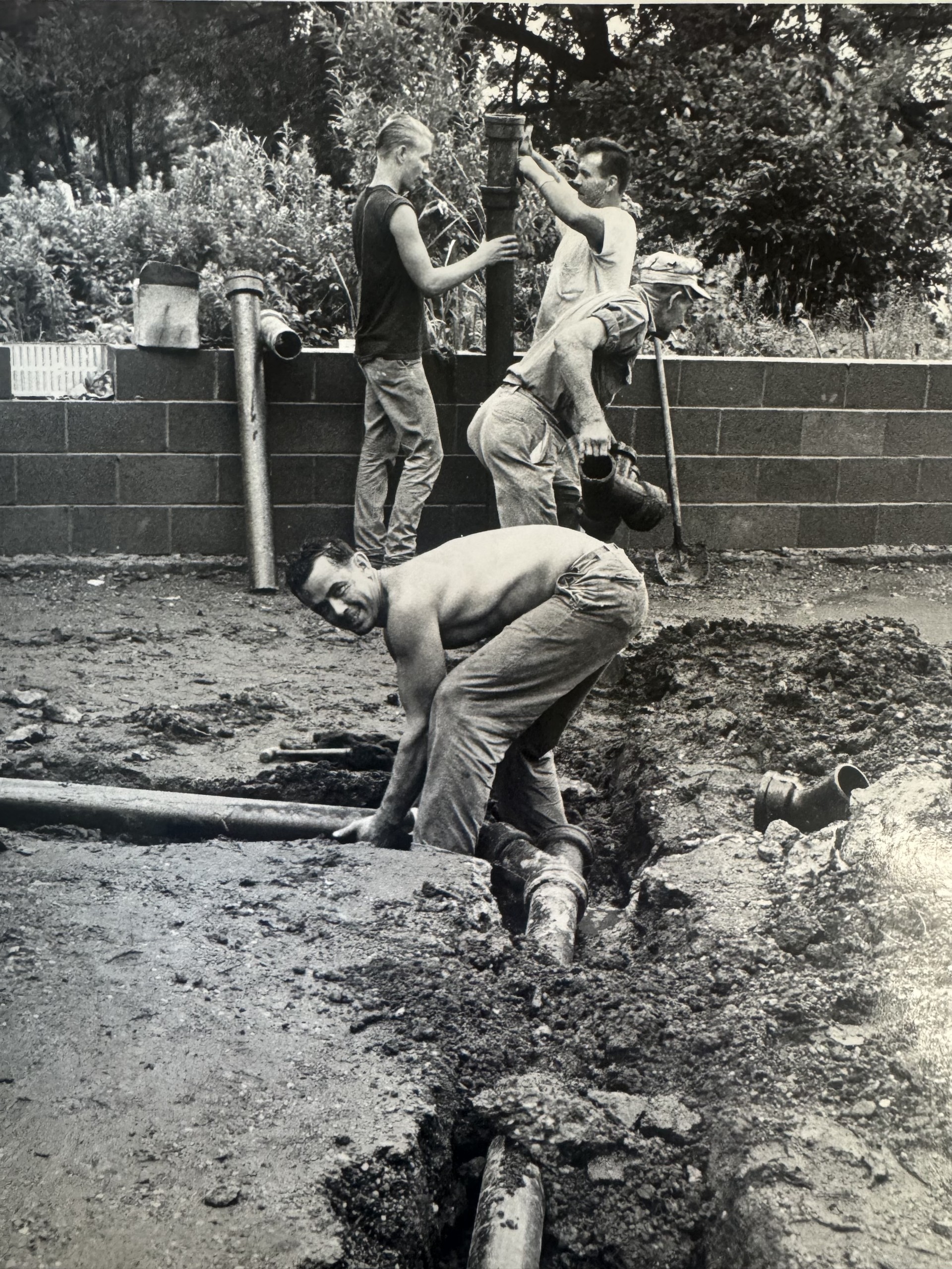Historic Clark Plumbing team working on a plumbing project in Akron